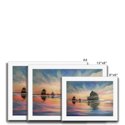 Sunset at Haystack Rock Framed Print