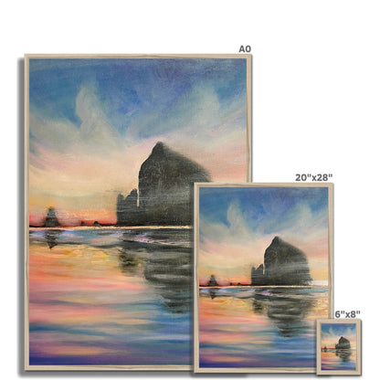 Sunset at Haystack Rock Framed Print